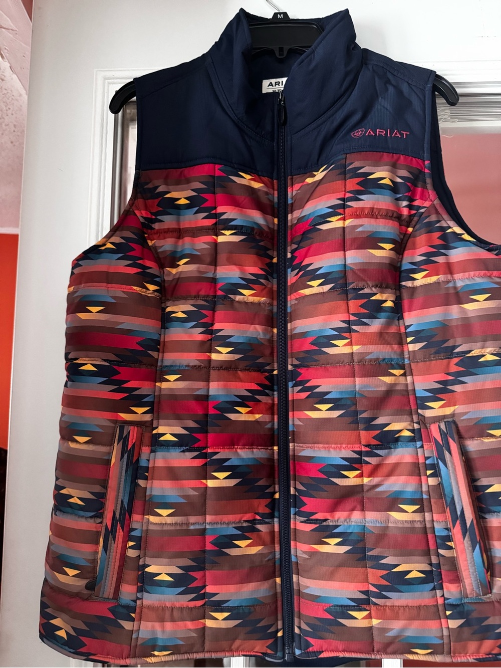 Ariat women’s Multicolor Aztec Puffer Vest with Navy Yoke